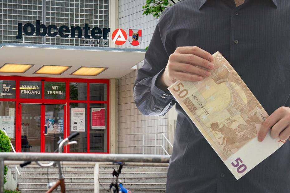 Mann mit 50 Euro Schein vor Jobcenter
