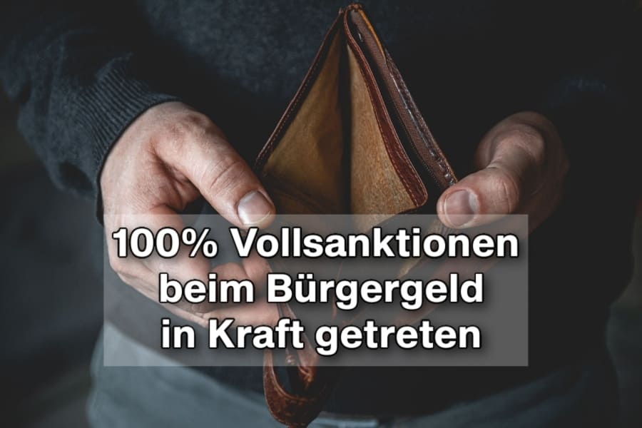 Leere Geldbörse mit Schriftzug 100% Sanktionen Bürgergeld