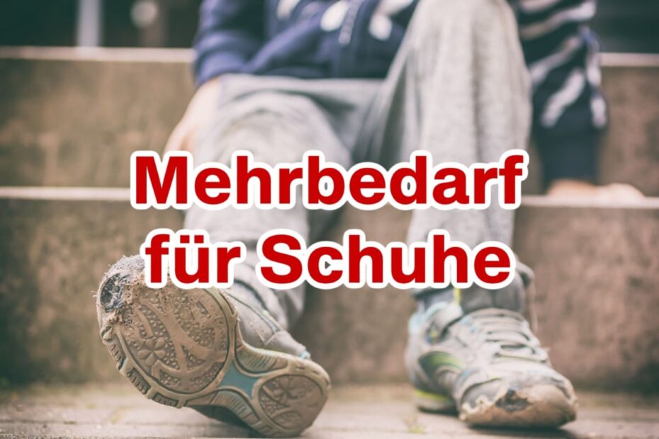 Füße mit verschlissenen Schuhen