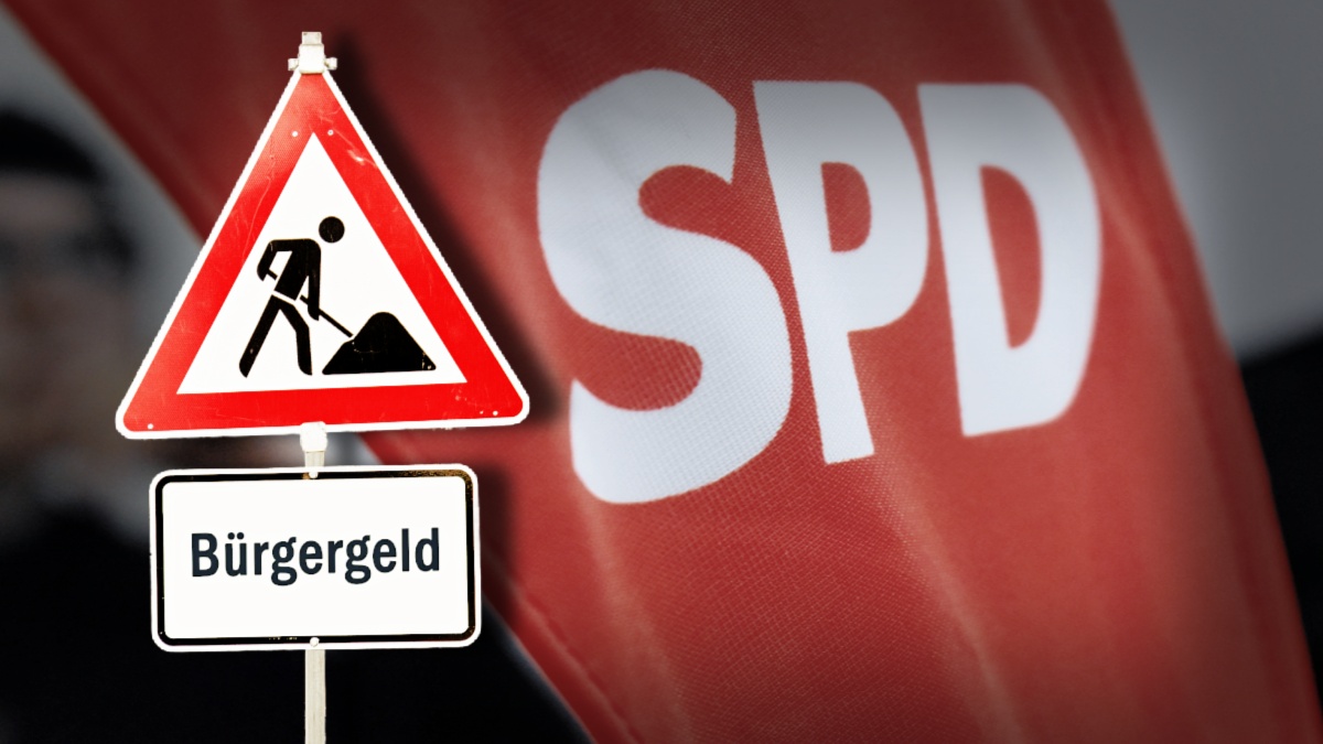 Baustellen Schild mit Aufschrift "Bürgergeld" vor großer roter Flagge der SPD